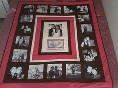 a red and black quilt with pictures on it in the center, sitting on a bed