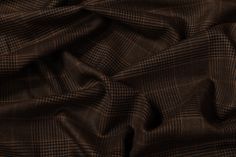 a brown and black checkered fabric