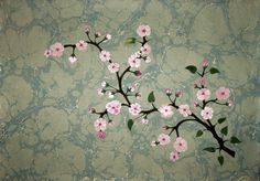 a painting of pink flowers and green leaves on a light blue wallpapered background