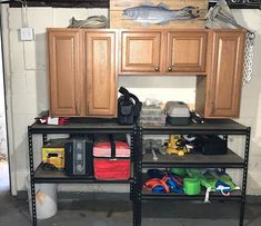 the garage is filled with various items to use for workbench storage and organization