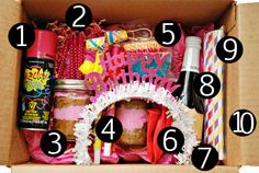 a box filled with lots of different types of birthday decorations and confetti sticks