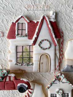 some cookies are decorated to look like houses