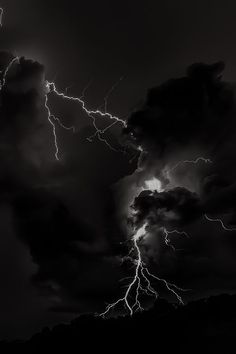 black and white photograph of lightning in the sky