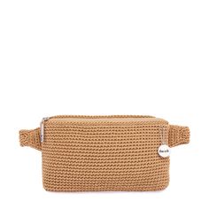 a brown knitted bag with a white tag on it