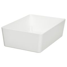 a white square bowl sitting on top of a table