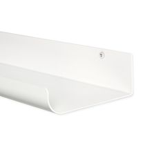 a white shelf that has a metal hook on it's side and is attached to the wall