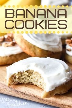 banana cookies with white frosting on a cutting board