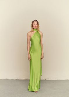 Asymmetrical bow neck dress Tropical Elegant Dress, Italian Wedding Guest Outfit Dresses, Mango Dress Outfit, Green Halter Neck Dress For Formal Occasions, Elegant Green Halter Neck Dress, High Neck Wedding Guest Dress, Green Halter Neck Evening Dress For Gala, Elegant Fitted Green Halter Dress, Chic Green Sleeveless Evening Dress