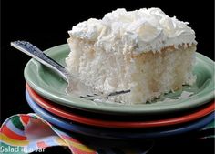 a piece of cake sitting on top of three plates