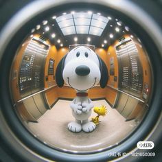 a cartoon dog is standing next to a little chick in a store's elevator