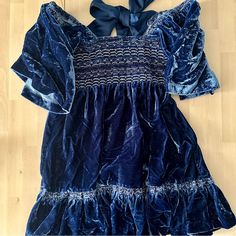 - Crushed Velvet Mini Dress - Big Belle Sleeves - Ties In The Back - Ruching Along Back To Expand Back Size Glamorous Velvet Mini Dress, Free People Bluebell Dress, Free People Gold Velvet Dress, Free People Ivy Velvet Mini Dress, Black Ruffle Dress, Velvet Mini Dress, Free People Dresses, Mini Velvet Dress, Black Ruffle