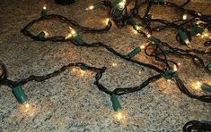 a bunch of christmas lights that are on the ground