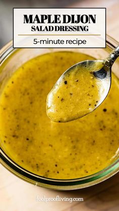 a spoon full of mustard with the title maple dijon salad dressing 5 - minute recipe