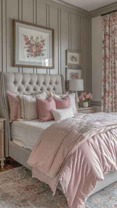 a bedroom with pink and gray decor