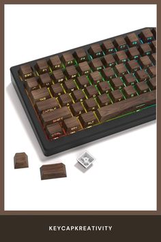 the keyboard is made out of wood and has green keys