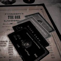 a black and white photo of some credit cards