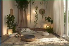 a room with plants and pillows on the floor