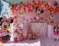 minnie mouse birthday party with balloons and decorations