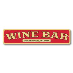 a red and yellow sign that says wine bar indianapolis, indiana on it's side