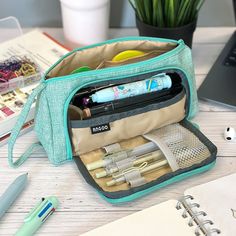 Store all your stationery supplies with our large capacity portable pencil cases. Unzip the front window section to store your pens, pencils and markers.Â The front window design allows you to have easy access to both your writing tools and the main compartment. The main compartment can be used to hold larger items such as calculators, scissors, rulers, a stapler, white-out and highlighters. Two back pockets can hold items such as sticky notes, business cards and tape. A strap on the side allows Portable Green Pencil Case For Storage, Green Pencil Case With Pen Slots For School, Green Portable Rectangular Pencil Case, Cheap Pencil Case With Removable Pouch For On-the-go, Front Window Design, Portable Rectangular Pencil Case For On-the-go, Pencil Case Stationery, Earring Jewelry Box, Lace Tape