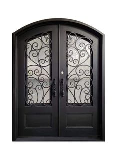 a black double door with intricate iron work