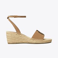 A vacation-ready sandal, the Ines espadrille wedge features a suede upper — detailed with a double-stacked logo — and a buckled strap that wraps around the ankle for a flattering and secure fit. Set on a jute wedge sole, the slight lift elevates any look.Crafted in partnership with a Leather Working Group-certified tannery, supporting high standards in leather manufacturing and chemical management. Designer Espadrilles, Wedges Style, Low Heel Sandals, Espadrille Shoes, Footwear Design Women, Espadrilles Wedges, Strap Heels, Low Heels, Wedge Sandals