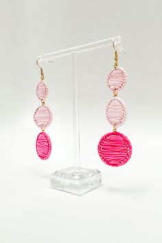 Details: Everyone's hearts will go round and round when they catch a glimpse of these Aislynn Circle Raffia Drop Earrings! With a beautiful circle shape and soft raffia detailing, these earrings will bring subtle femininity and style to any ensemble! - Metal- Raffia- Fish hookContent: 3.5" LBrand: Golden StellaFinal sale item Pink Dangle Hoop Earrings For Summer, Summer Pink Dangle Hoop Earrings, Pink Hoop Earrings For Spring Beach Occasions, Pink Hoop Earrings For Beach And Spring Season, Pink Hoop Earrings For Beach During Spring, Pink Round Jewelry For Spring, Pink Circle Earrings As A Gift, Pink Circle Earrings For Gift, Pink Circle Earrings For Gifts