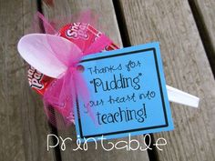 a candy bar wrapped in pink and blue paper with a saying on it that says thanks for puddinging your head into teaching