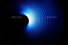 an abstract blue light tunnel in the dark - stock photo - images