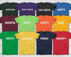 DESIGN COLOR: White DEFAULT T-SHIRT COLORS: 1. Huntsman - Forest Green 2. Prince - Navy 3. Snow White - Yellow 4. Evil Queen - Black 5. Grumpy - Red 6. Happy - Royal Blue 7. Dopey - Lime Green 8. Sneezy - Irish Green 9. Sleepy - Orange 10. Doc - Gold 11. Bashful - Maroon *message me to request toddler and baby sizes, and long sleeve shirts. ----------------------------------------------- Most designs in the shop can be customized, additional costs may apply depending on the custom request. Feel Seven Dwarfs Costume Group, Dwarfs Costume, Seven Dwarfs Costume, Snow White And Seven Dwarfs, Snow White Prince, Snow White Evil Queen, Not So Scary Halloween Party, Not So Scary Halloween, Couple Tees