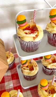 cupcakes on trays with candy and candies