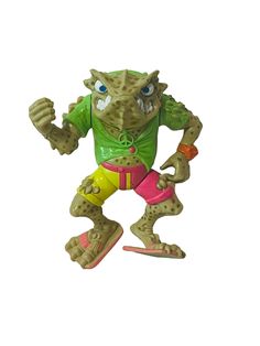 an action figure is shown in the shape of a monster with blue eyes and pink pants