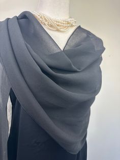 This fasionable versatile sheer chiffon shawl can be used to dress up an outfit for a special evening, a wedding or as a neck scarf. Effortlessly give a dress a new look by simply adding this shawl. Perfect as bridesmaid gifts or wedding favours, the perfect gift for any occasion. Mix and match with similar or contrast color jewelry, soaps, hand lotions or a box of chocolates and make the perfect personalized gift pack. Perfect as wedding coverup, bridesmaids gifts. Measures 20"Wx 74"L rectangul Elegant Silk Draped Dupatta, Elegant Draped Silk Dupatta, Formal Sheer Chiffon Dupatta, Elegant Sheer Dupatta For Formal Occasions, Formal Chiffon Dupatta, Elegant Silk Shawl Scarf For Wedding, Elegant Sheer Georgette Dupatta, Elegant Evening Silk Scarf Shawl, Elegant Sheer Dupatta Shawl