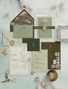 the wedding stationery is laid out neatly and ready to be put into their guests'bags