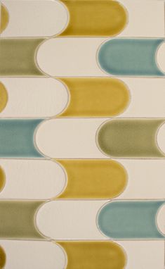 an abstract wallpaper with wavy lines in shades of blue, yellow and green on white