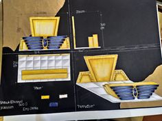 an image of a paper cut out of a construction site with blue and yellow plates