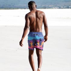 There is nothing more majestic than a beautiful sunset over the crashing waves of the ocean. There aren't many words that can describe it, but we've tried to capture the feeling with these shorts. * Fabric composition: (may vary by 5%) 91% recycled polyester, 9% spandex * Liner composition: 92% polyester, 8% spandex * Fabric weight (may vary by 5 5.13 oz/yd² (174 g/m²)  * Four-way stretch water-repellent microfiber fabric * Anti-chafe mesh inner liner * Elastic waistband with drawcord * Mesh poc Beach Season Bermuda Swim Trunks, Bermuda Swim Trunks For Vacation Beachwear, Bermuda Beachwear Swim Trunks For Vacation, Beachy Short Swim Trunks For Vacation, Bermuda Swimwear For Beach Season Vacation, Bermuda Swim Trunks For Beach, Bermuda Style Swim Trunks For Beach, Blue Tropical Print Beachwear Shorts, Multicolor Hawaiian Shorts For Beach Season