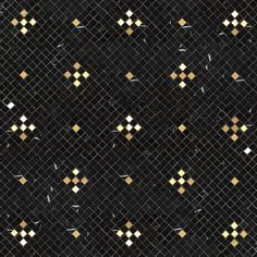 a black and gold tiled wall with small squares