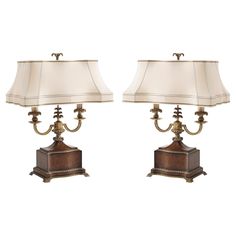 a pair of lamps sitting next to each other