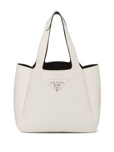 white leather silver-tone logo plaque pebbled texture two rounded top handles main compartment White Designer Handbags, Prada Leather Tote, Zapatillas Veja, Prada Tote Bag, Prada Collection, White Tote Bag, Backpack Brands, White Tote