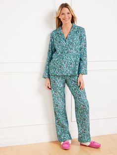 Our essential matching pajama set in a leafy floral pattern. Features a relaxed button front shirt with notched lapels. Coordinating pants are detailed with an elastic drawstring waist and side pockets. Crafted from cotton flannel for just right warmth and comfort while you sleep. What's not to love? Features Long Sleeve Notched Lapel Collar Pajama Set Imported Fit: Top: Misses: 27 3/4; Plus: 30 3/4" Bottom Inseam: Misses: 29 1/2"; Plus 29 1/2" Material: 100% Cotton Care: Machine Wash Cold; Only Matching Pajama Set, Sleep Sets, Matching Pajama, Cotton Pajama Sets, Classic Style Women, Matching Pajamas, Sleep Set, Cotton Pyjamas, Pajama Sets