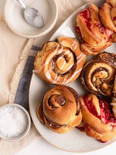 a white plate topped with different types of pastries