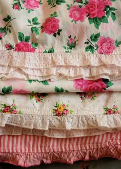 three different types of fabric with pink flowers on them and one is white, the other has pink roses