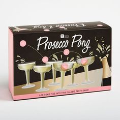 three champagne flutes in front of a pink and black box with the words prosceco poop on it