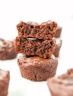 chocolate cupcakes stacked on top of each other