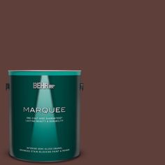 the behr marquee paint is dark brown and has a green tint