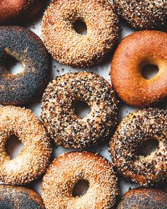 many different kinds of donuts with sprinkles on them