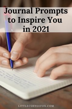 a person writing on a notebook with the words journaling journals to inspire you in 2021