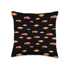 a black pillow with colorful fish on it