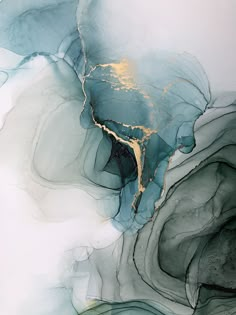 an abstract painting with gold and blue colors on it's surface is featured in this image